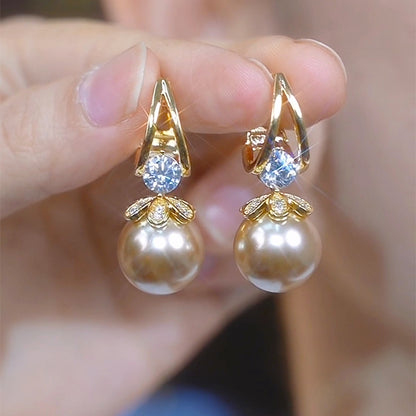【Compre uno y llévese otro gratis】 Pendientes de plata con perlas de lujo francés de nuevo estilo