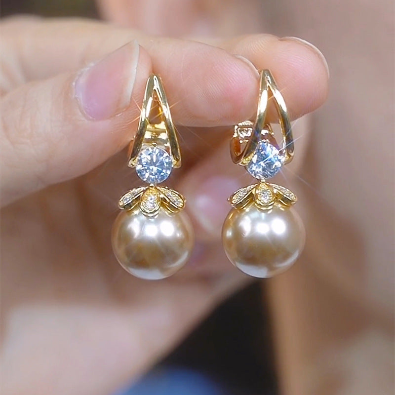【Compre uno y llévese otro gratis】 Pendientes de plata con perlas de lujo francés de nuevo estilo
