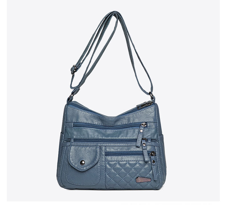 🔥Bolso de cuero suave de gran capacidad y múltiples capas para mujer