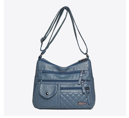 🔥Bolso de cuero suave de gran capacidad y múltiples capas para mujer