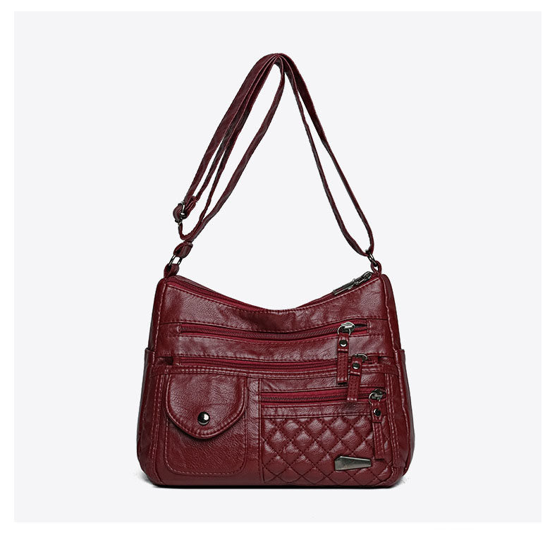 🔥Bolso de cuero suave de gran capacidad y múltiples capas para mujer