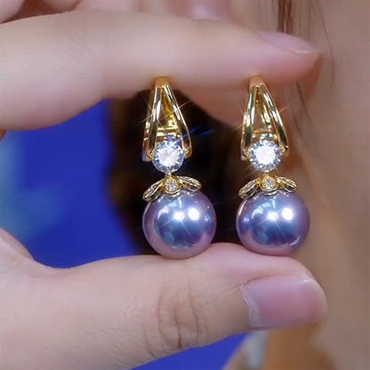 【Compre uno y llévese otro gratis】 Pendientes de plata con perlas de lujo francés de nuevo estilo